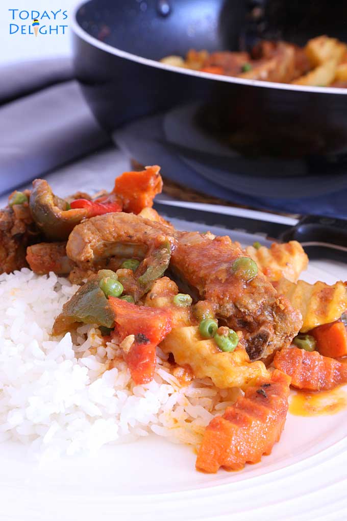 Rice and rib dish in plate.