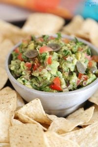 This is the best ever guacamole recipe paired with tortilla chips.