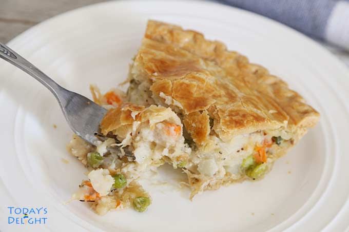 A bite of this delicious creamy turkey vegetable pie.