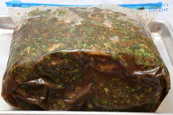 Marinated prime rib roast in zip lock bag.