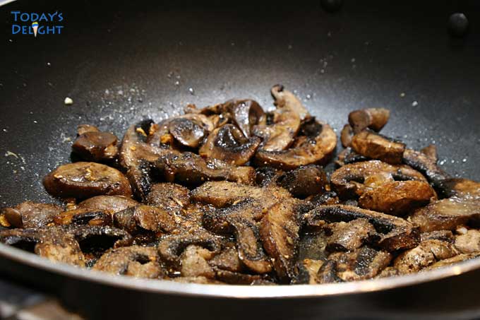 Season sauteed mushrooms with spices.