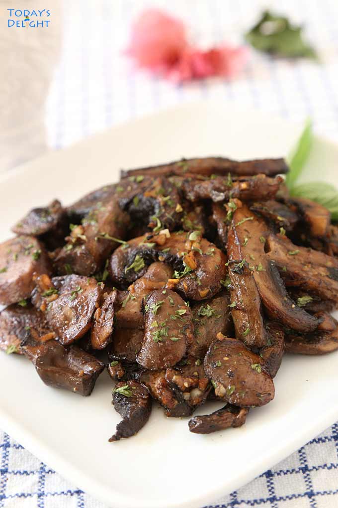 Sauteed Mushrooms in Garlic Butter and Onion in plate is Today's Delight.