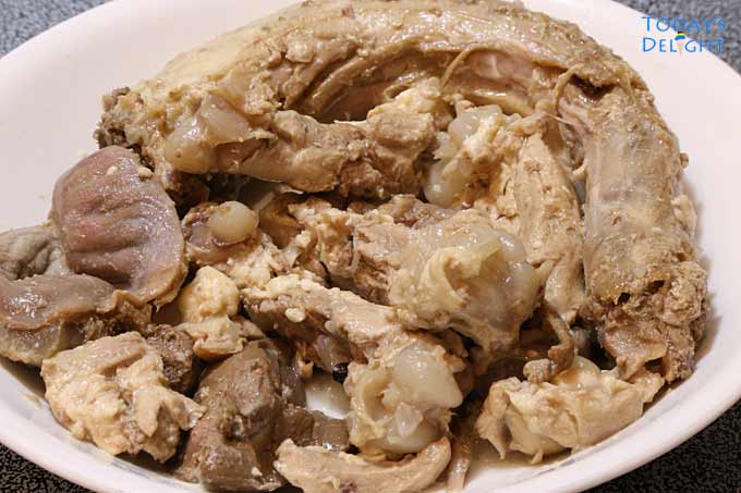 Boiled giblets in plate.