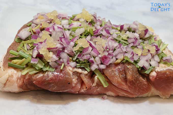 Stuffing added to pork belly.