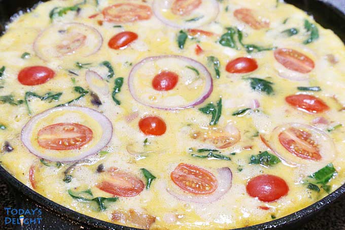 Cooking frittata in cast iron.