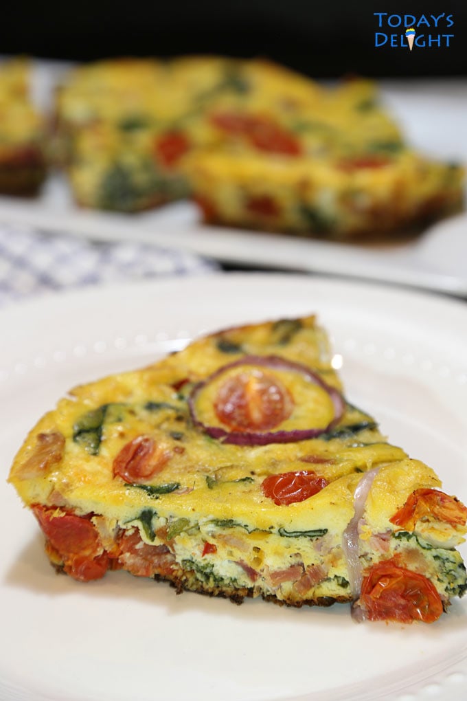 Slice of Bacon Spinach frittata.