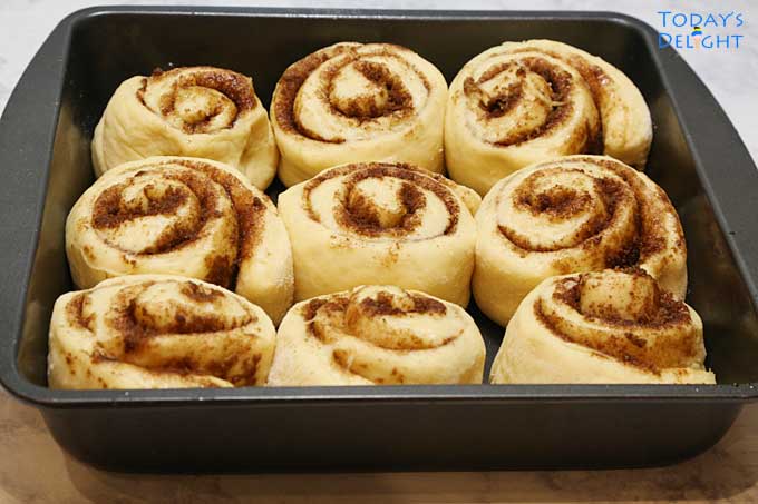 Cinnabon Cinnamon Rolls dough in baking pan.