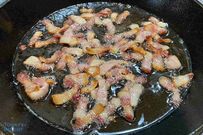 Frying bacon.