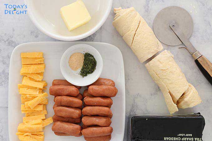 Ingredients for Crescent Roll Pigs in a Blanket with Garlic Herb Butter.