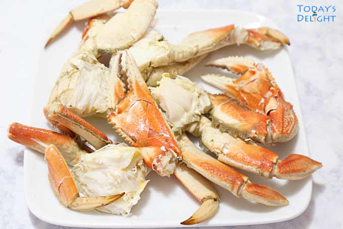 Dungeness crab cut into 4 pieces.