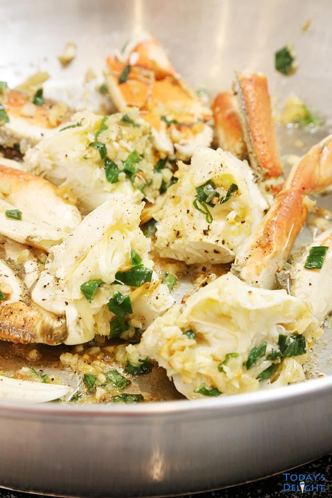 Ginger and Scallion Crab cooked in skillet is Today's Delight.