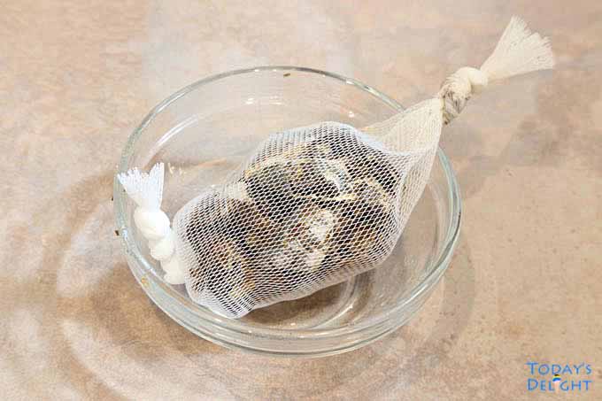 Smoked fish head and skin in sachet bag.