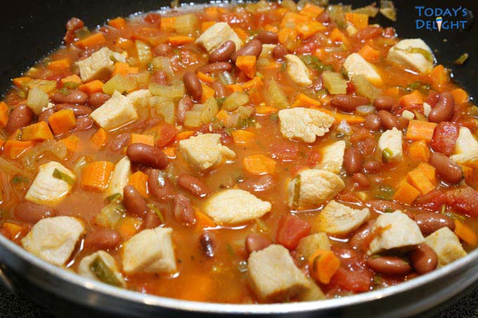 Chicken and kielbasa sausage added to stew.