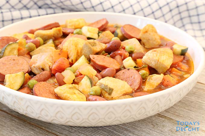 Servings of Kielbasa Chicken and Bean Stew in platter.