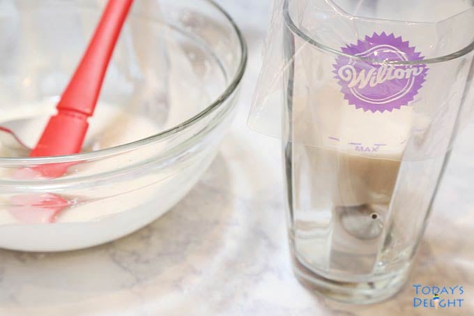 Wilton piping bag in a glass & bowl.