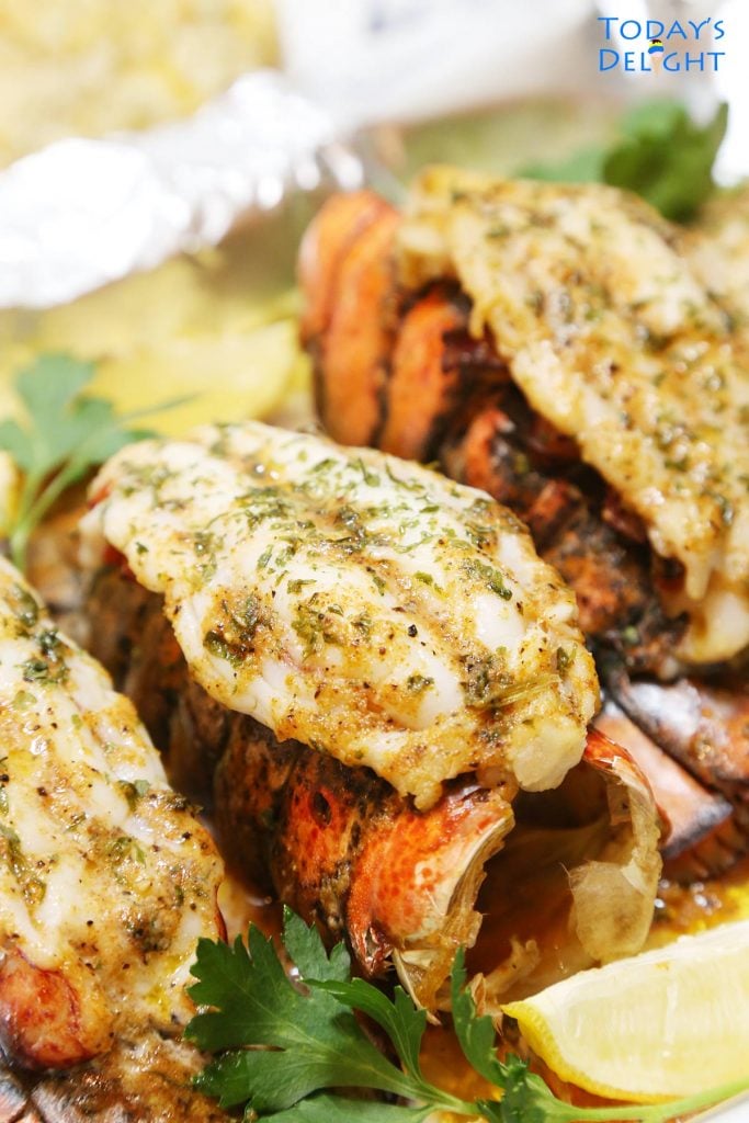 The Best Broiled Lobster Tail Recipe with 4 seasoned broiled lobster tail.