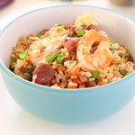 Shrimp Fried Rice with Chinese Sausage and Ham and vegetables in a bowl.