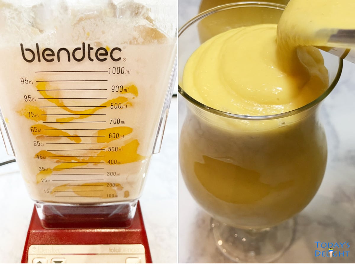 Mango smoothie ingredients in blender and poured in hurricane glass.