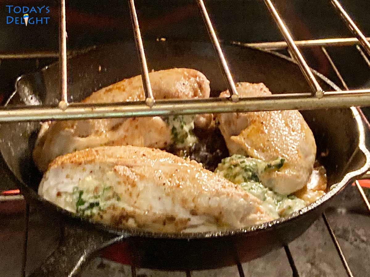 3 seared chicken breast in cast iron transferred to oven to bake.
