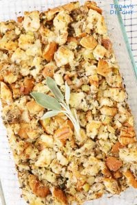 Turkey stuffing in a 9x13 pan garnish with sage leaves.