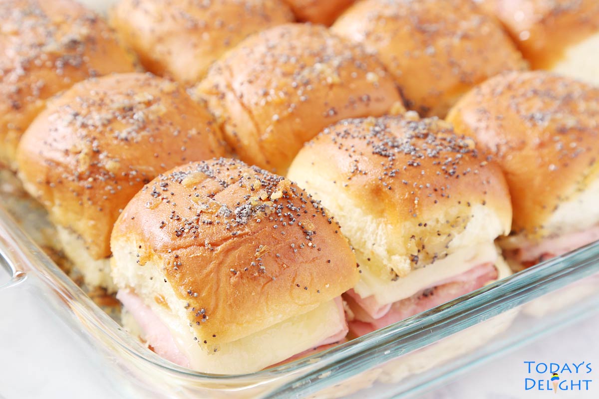 Baked sliders in baking pan.