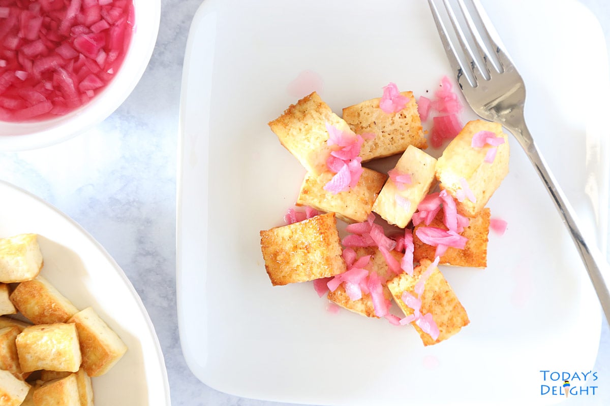 Air fried tofu with vinegar and red onion dip.